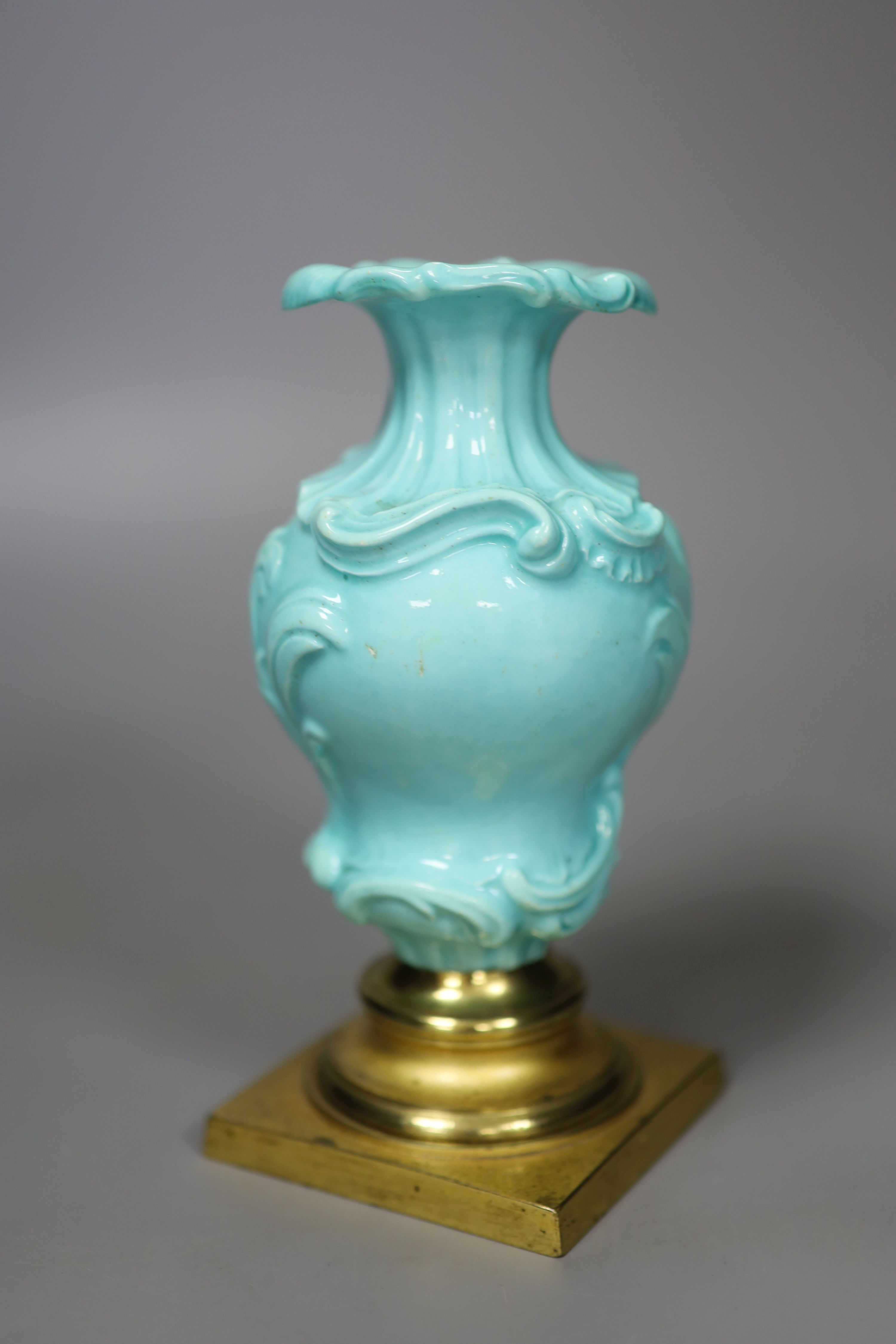 A Chelsea Derby rare rococo moulded vase with celadon type ground, mount on a gilt metal base, from the collection of Dr. Alasdair Morr